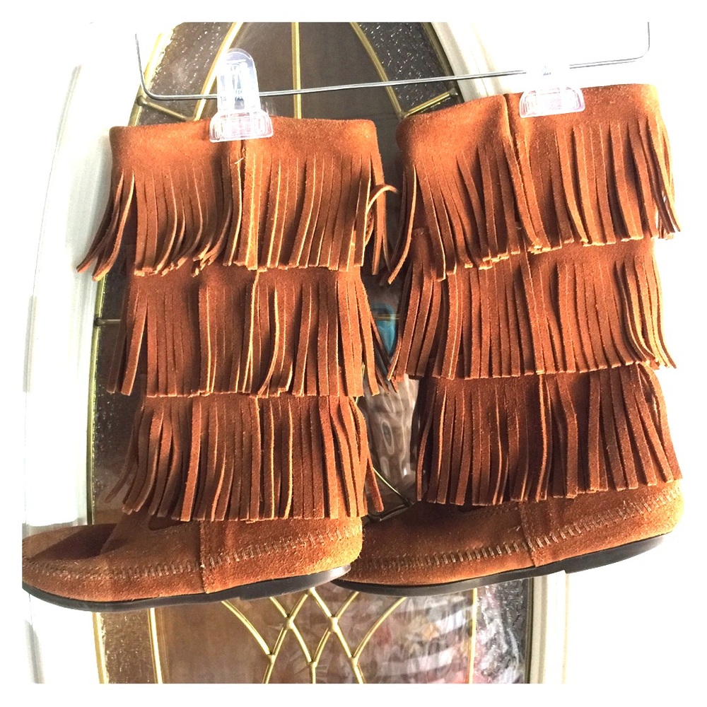 EUC Minnetonka fringed boots